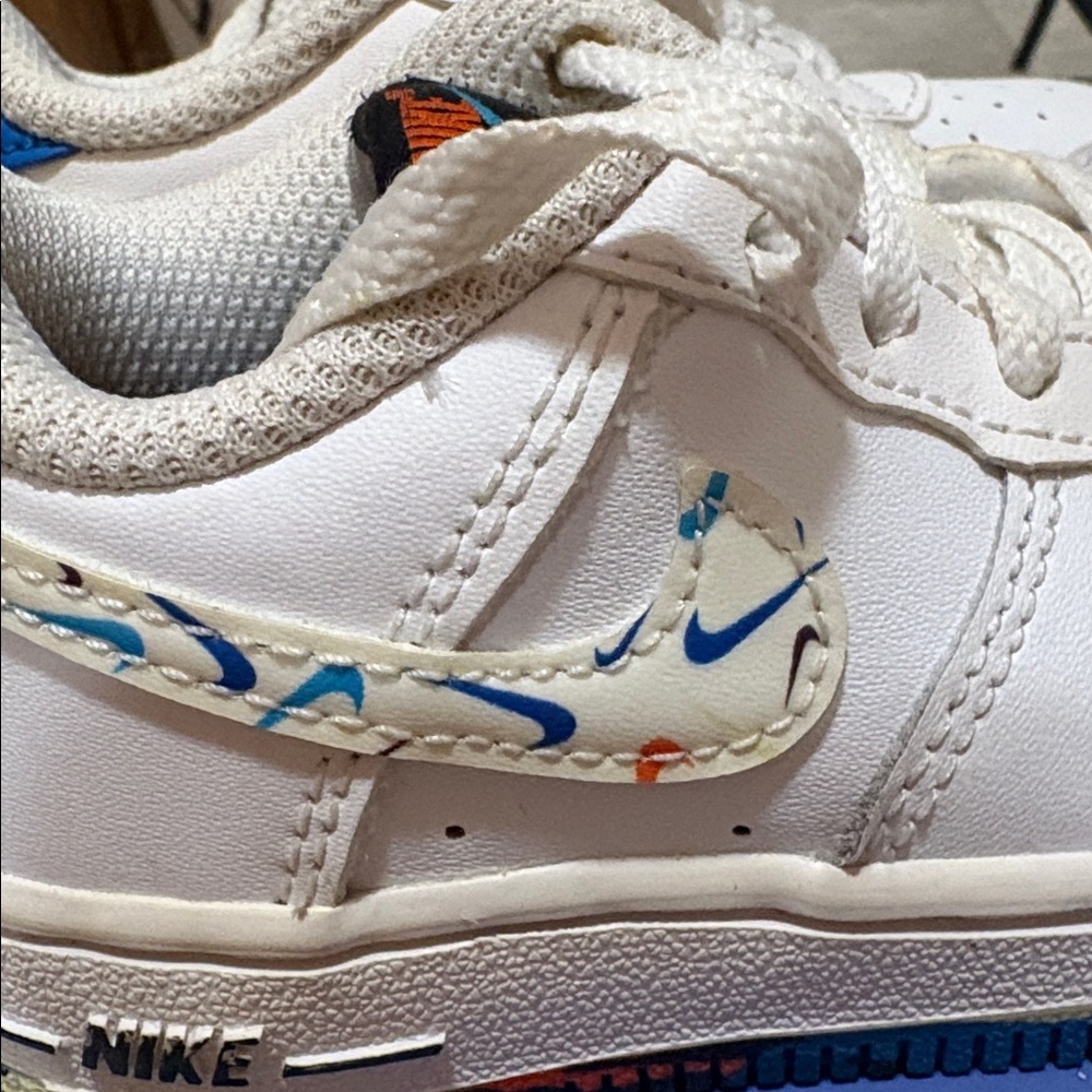 Nike Kids White Low-Top Sneakers with Multicolor Swoosh Accent